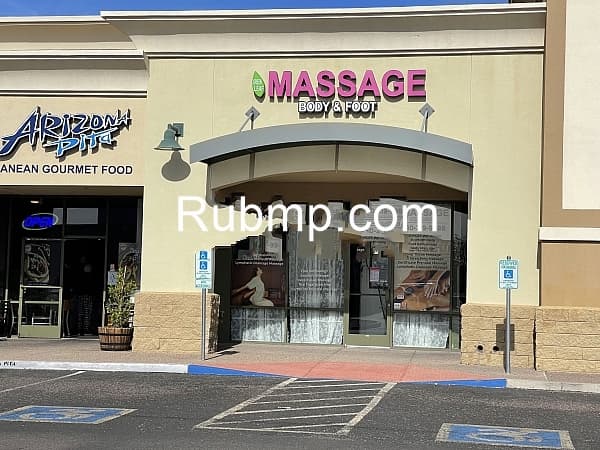 Photo of Green leaf body and foot massage